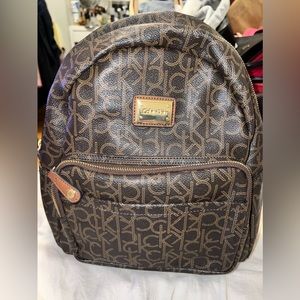 Calvin Klein brown and gold backpack purse